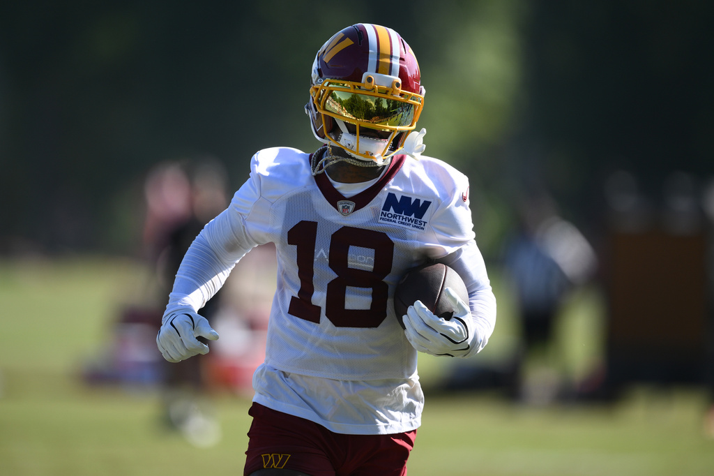 Washington Commanders wide receiver Stefon Diggs works out during practice at the team's NFL football training camp, Friday, Aug. 7, 2026 in Ashburn, Va. (AP Photo/Nick Wass)