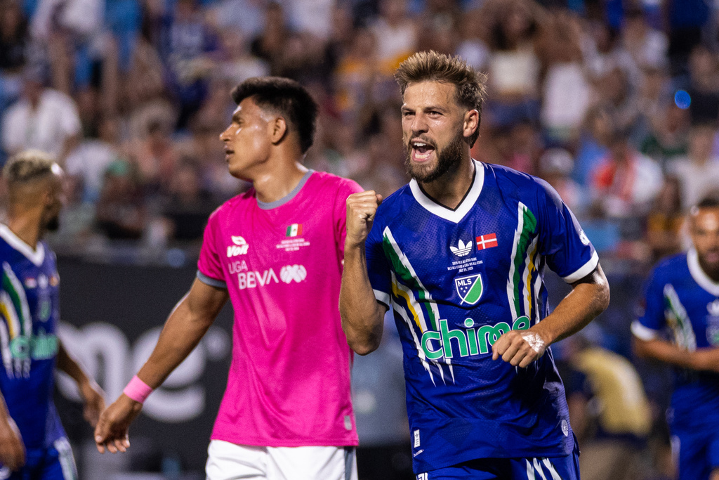 MLS All-Star Philip Zinckernagel (11) celebrates after scoring during the MLS All-Star soccer game Wednesday, July 29, 2026, in Charlotte, N.C. (AP Photo/Scott Kinser)