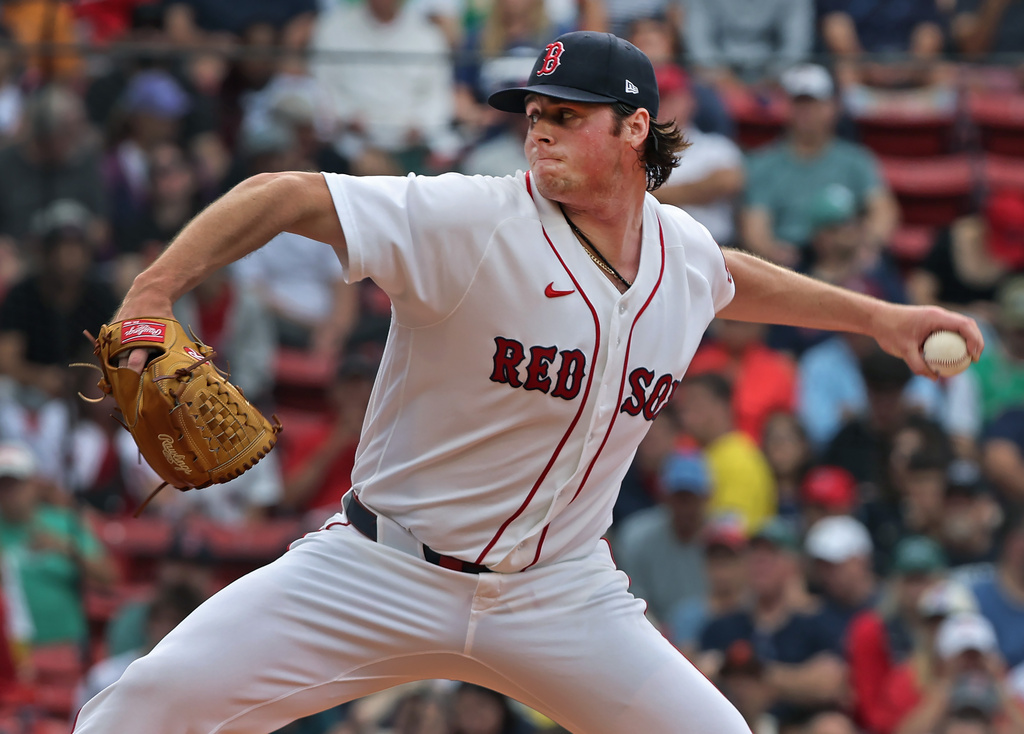 Boston Red Sox pitcher Jake Bennett throws in the first inning of a baseball game against the San Francisco Giants, Sunday, Aug. 23, 2026, in Boston. (AP Photo/Jim Davis)