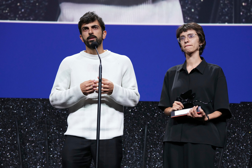 Yuval Abraham, left, and Rachel Szor accept the special jury prize for the film 'Naza' during the closing ceremony of the 83rd edition of the Venice Film Festival in Venice, Italy, on Saturday, Sept. 12, 2026. (Photo by Scott A Garfitt/Invision/AP)