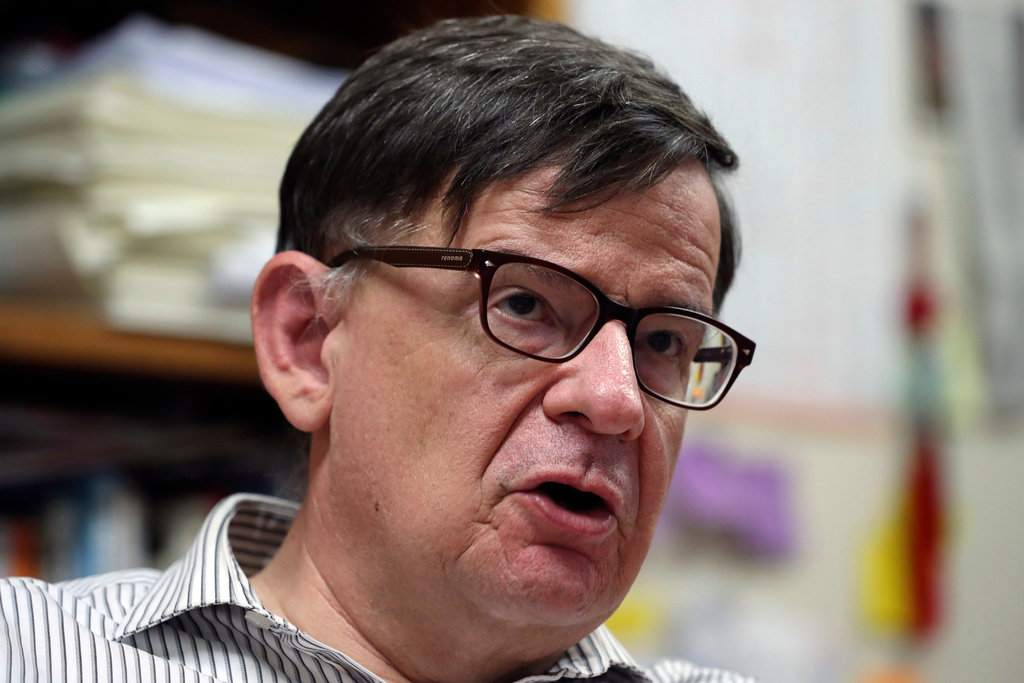 FILE - In this Sept. 20, 2017, photo, Andrei Lankov, a North Korea expert at Kookmin University answers a reporter's question during an interview in Seoul, South Korea. (AP Photo/Lee Jin-man, File)