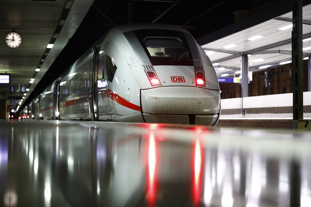 A train is parked on a platform at Hannover Central Station, Tuesday, June 23, 2026. (Moritz Frankenberg/dpa via AP)