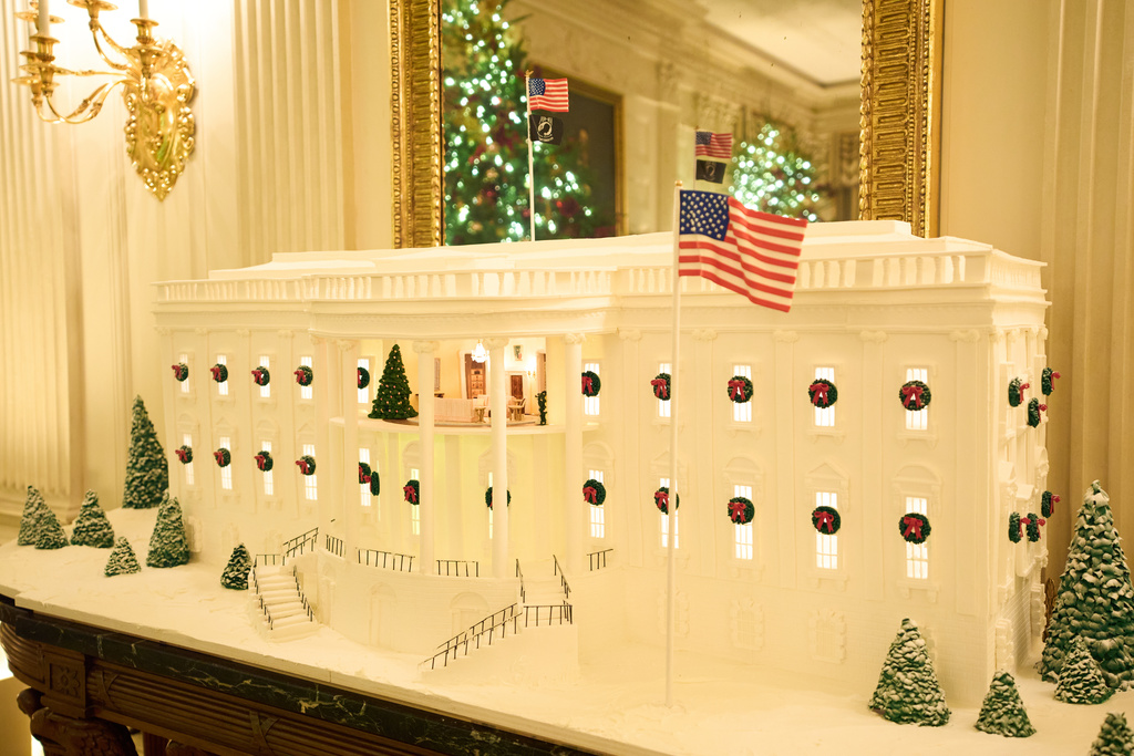 A Ginger Bread House decorates the State Dining Room of the White House during a press preview of the Christmas decorations "Home is Where the Heart Is," Monday, Dec. 1, 2025, in Washington. (AP Photo/Evan Vucci)