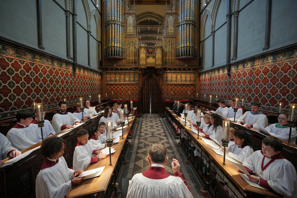 Britain Choral Music Choristers sing during Evensong at Rochester Cathedral in Rochester, England, Friday, March 27, 2026. (AP Photo/Kin Cheung)