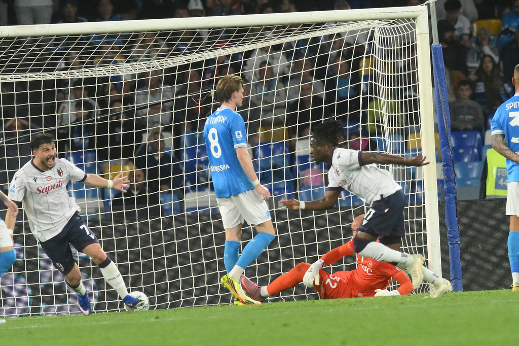 Bologna's Jonathan Rowe celebrates after scoring during the Italian Serie A soccer match between Napoli and Bologna in Naples, Italy, Monday, May 11, 2026. (Alessandro Garofalo/LaPresse via AP)