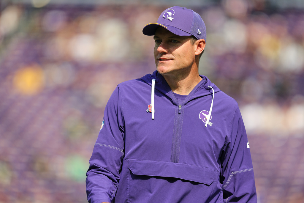 Minnesota Vikings head coach Kevin O'Connell watches warmups before an NFL football game against the Green Bay Packers, Sunday, Sept. 13, 2026, in Minneapolis, Minn. (AP Photo/Bailey Hillesheim)