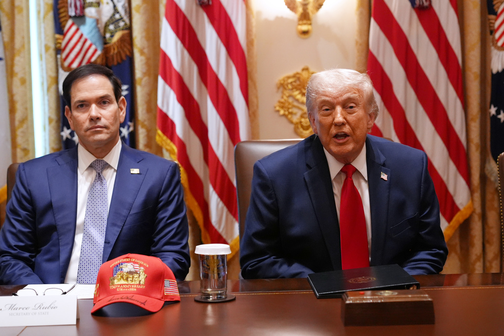 President Donald Trump, next to Secretary of State Marco Rubio, speaks during a Cabinet meeting at the White House, Wednesday, May 27, 2026, in Washington. (AP Photo/Jacquelyn Martin)
