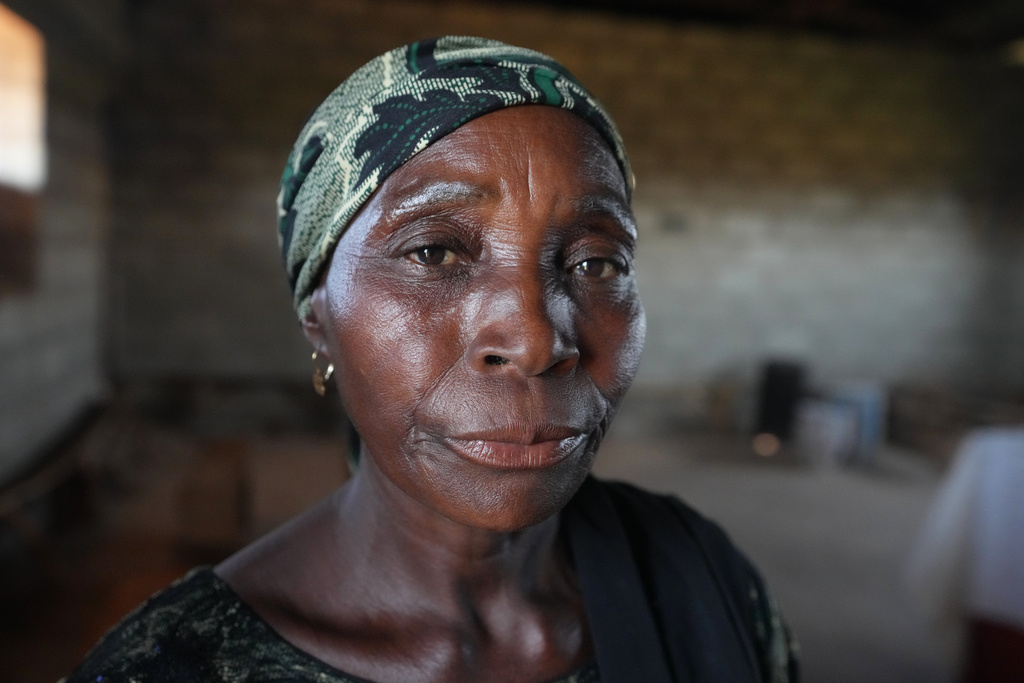 Tabitha Danladi, a 52-year-old mother of four who was kidnapped in June and later released and told to raise money to free her husband, is shown during an interview with The Associated Press in Kaduna, northwestern Nigeria, Nov. 6, 2025. "I've sold everything and they have been collecting ransoms but we don't know if he's still alive," said Danladi. (AP Photo/Sunday Alamba)