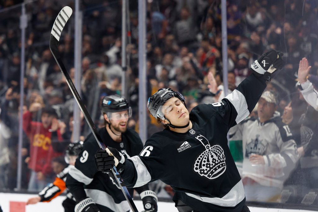 Los Angeles Kings left wing Andrei Kuzmenko (96) reacts after scoring during the second period of an NHL hockey game, Saturday, Dec. 6, 2025, in Los Angeles. (AP Photo/Caroline Brehman)