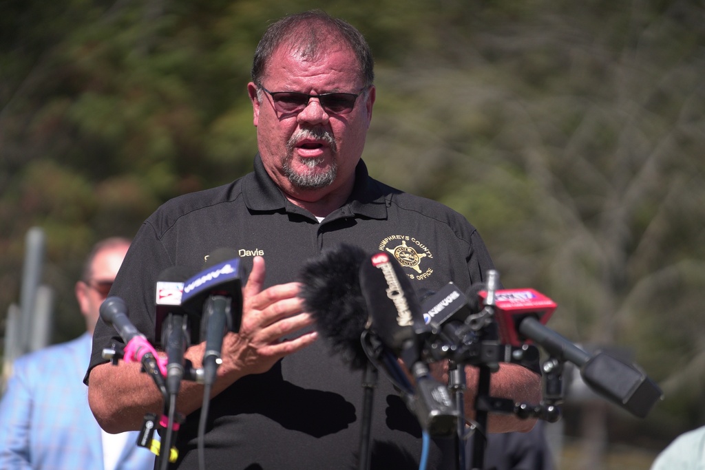 Humphreys County Sheriff Chris Davis, right, speaks during a news conference Monday, Oct. 13, 2025, in McEwen, Tenn., at Accurate Energetic Systems. (AP Photo/Obed Lamy)