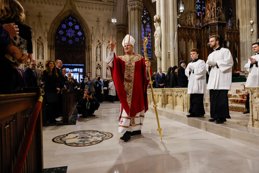 Archbishop Ronald Hicks gives a blessing after his Mass of Installation at St. Patrick's Cathedral, Friday, Feb. 6, 2026, in New York. (AP Photo/Stefan Jeremiah, Pool)