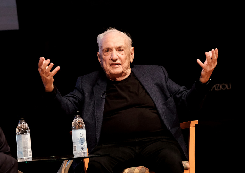 FILE - Architect Frank Gehry describes his concert hall design at the Colburn School during an unveiling in downtown Los Angeles on Wednesday, March 16, 2022. (AP Photo/Richard Vogel, File)