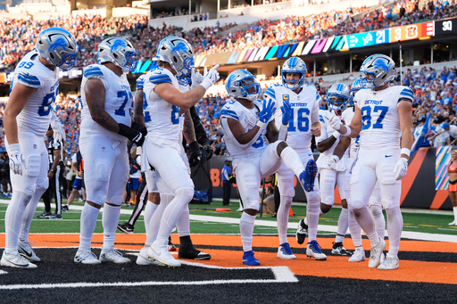 Detroit Lions running back David Montgomery (5) celebrates his eight-yard touchdown against the Cincinnati Bengals during the second half of an NFL football game Sunday, Oct. 5, 2025, in Cincinnati. (AP Photo/Carolyn Kaster) Detroit Lions running back David Montgomery (5) celebrates his eight-yard touchdown against the Cincinnati Bengals during the second half of an NFL football game Sunday, Oct. 5, 2025, in Cincinnati. (AP Photo/Carolyn Kaster)