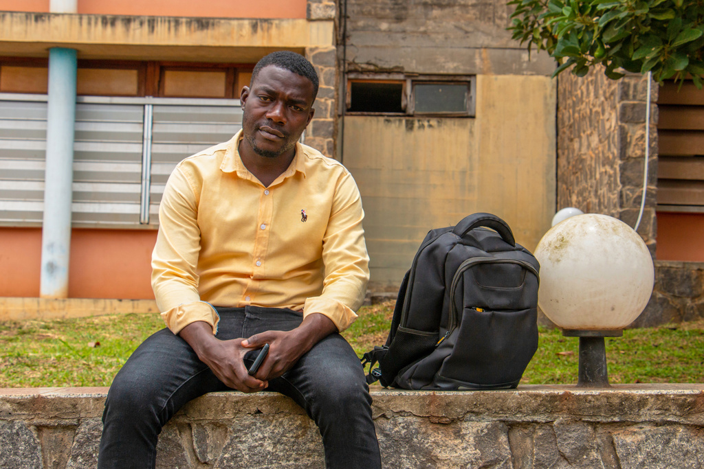 Manoung Gauthier Wilfried, 27, a student, poses on the campus of the University of Yaoundé I, Cameroon, Sept 12, 2025. (AP Photo / Welba Yamo Pascal)