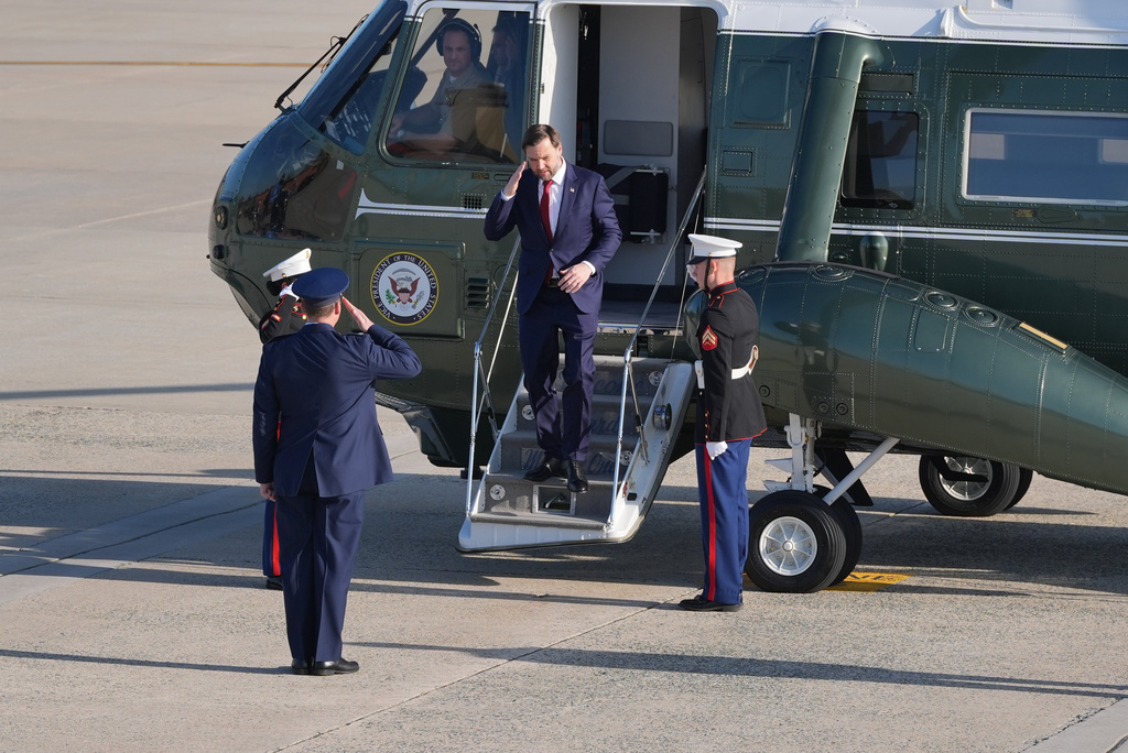 Vice President JD Vance walks off Marine Two to walk and board Air Force Two, Friday, April 10, 2026, at Joint Base Andrews, Md., for expected departure to Pakistan, for talks on Iran. (AP Photo/Jacquelyn Martin, pool)