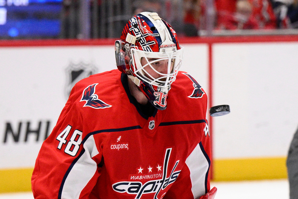 Washington Capitals goaltender Logan Thompson (48) watches the puck during the second period of an NHL hockey game against the Vegas Golden Knights, Friday, Feb. 27, 2026, in Washington. (AP Photo/Nick Wass)
