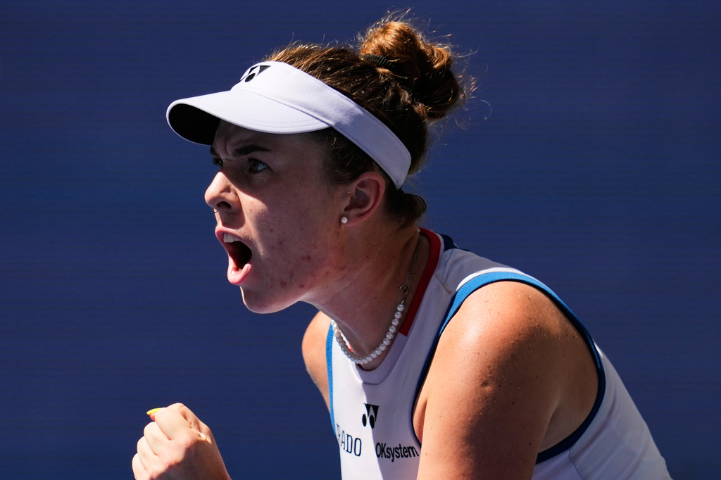 Linda Noskova, of the Czech Republic, reacts during a match against Aryna Sabalenka, of Belarus, during the quarterfinal round of the U.S. Open tennis championships, Tuesday, Sept. 8, 2026, in New York. (AP Photo/Seth Wenig)