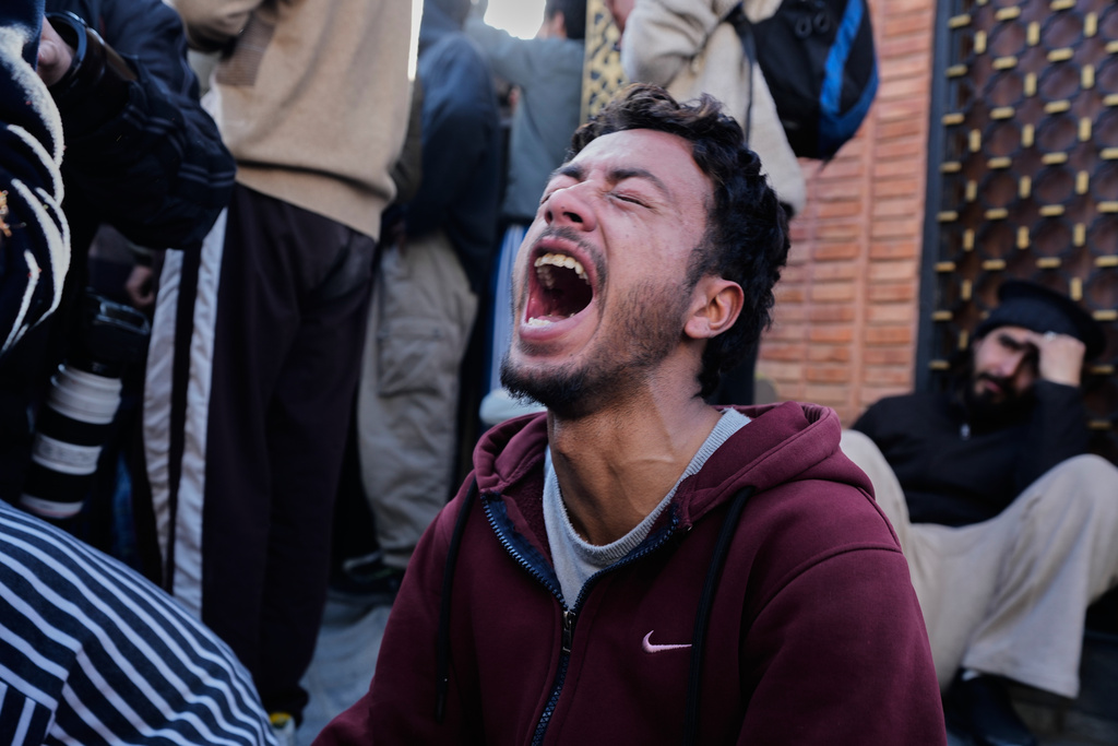 Shiite Muslims mourn the killing of Iranian Supreme Leader Ayatollah Ali Khamenei during a protest against the U.S. and Israel in Srinagar, Indian controlled Kashmir, Sunday, March 1, 2026. (AP Photo/Mukhtar Khan)
