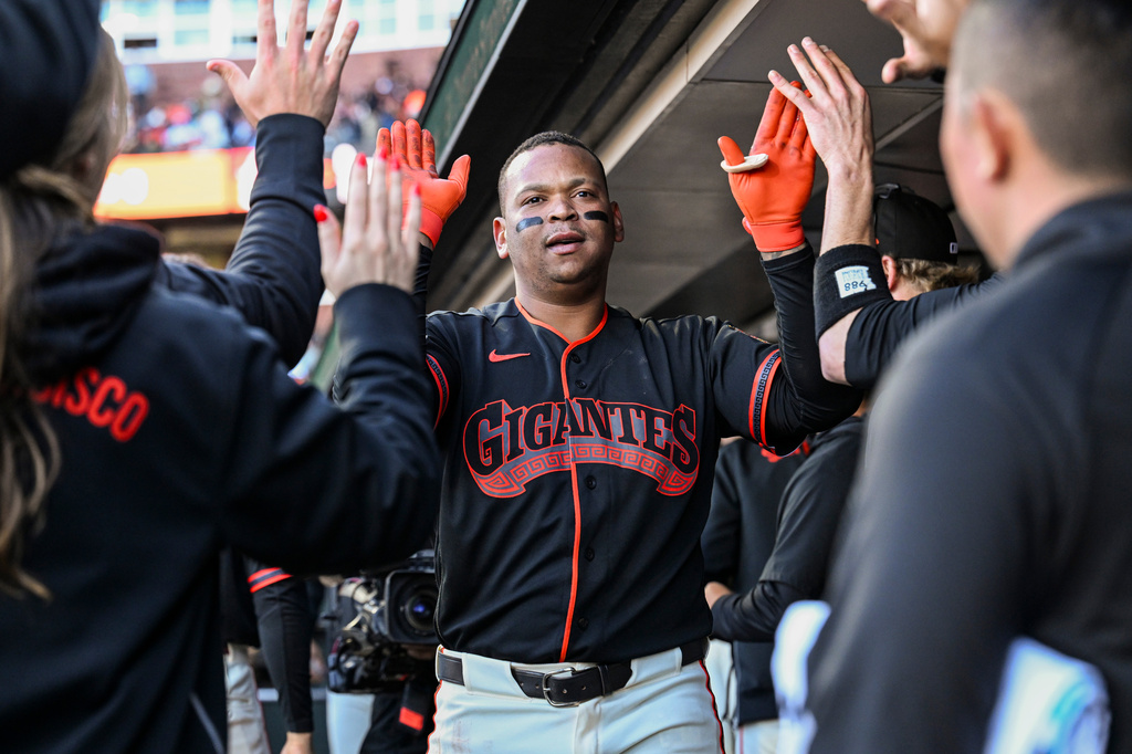 San Francisco Giants' Rafael Devers celebrates after hitting a solo home run during the second inning of a baseball game against the Atlanta Braves, Saturday, June 27, 2026, in San Francisco (AP Photo/Justine Willard)