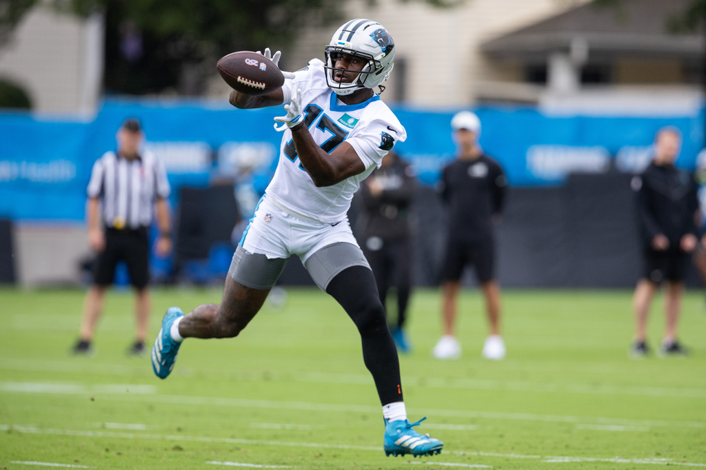 Carolina Panthers wide receiver Xavier Legette (17) makes a catch during the NFL football team's training camp Thursday, July 23, 2026, in Charlotte, N.C. (AP Photo/Scott Kinser)