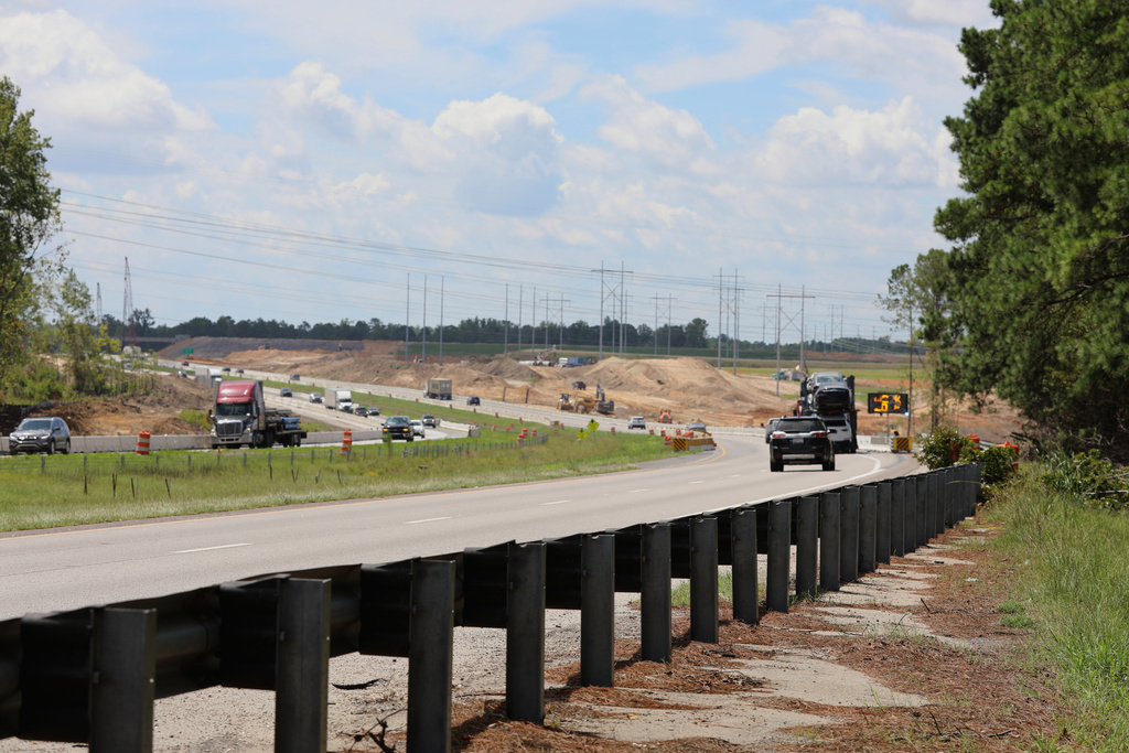 Roadwork is seen on Interstate 77 on Wednesday, Aug. 13, 2025, in Blythewood, S.C. (AP Photo/Jeffrey Collins)