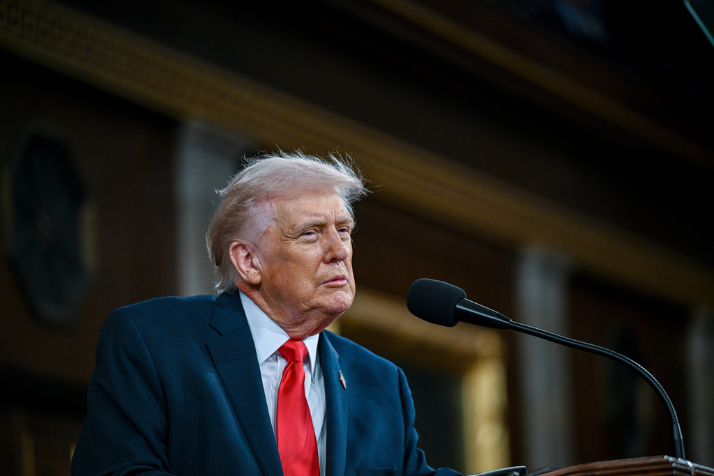 President Donald Trump delivers the State of the Union address to a joint session of Congress in the House chamber at the U.S. Capitol in Washington, Tuesday, Feb. 24, 2026. (Kenny Holston/The New York Times via AP, Pool)
