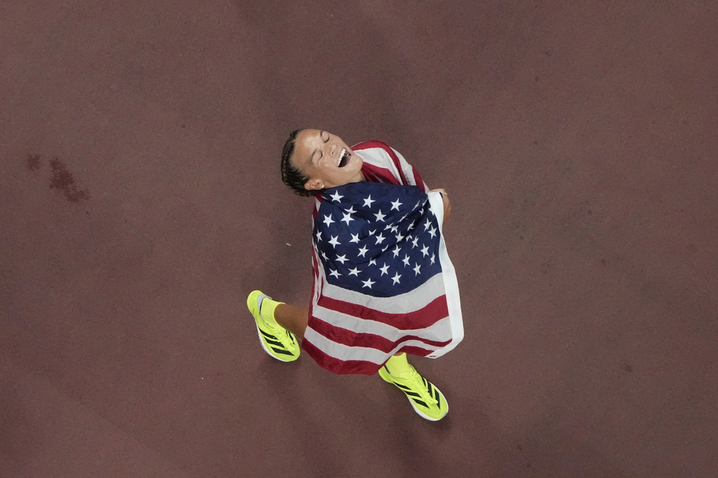 United States' Anna Hall celebrates after winning the heptathlon at the World Athletics Championships in Tokyo, Saturday, Sept. 20, 2025. (AP Photo/David J. Phillip)