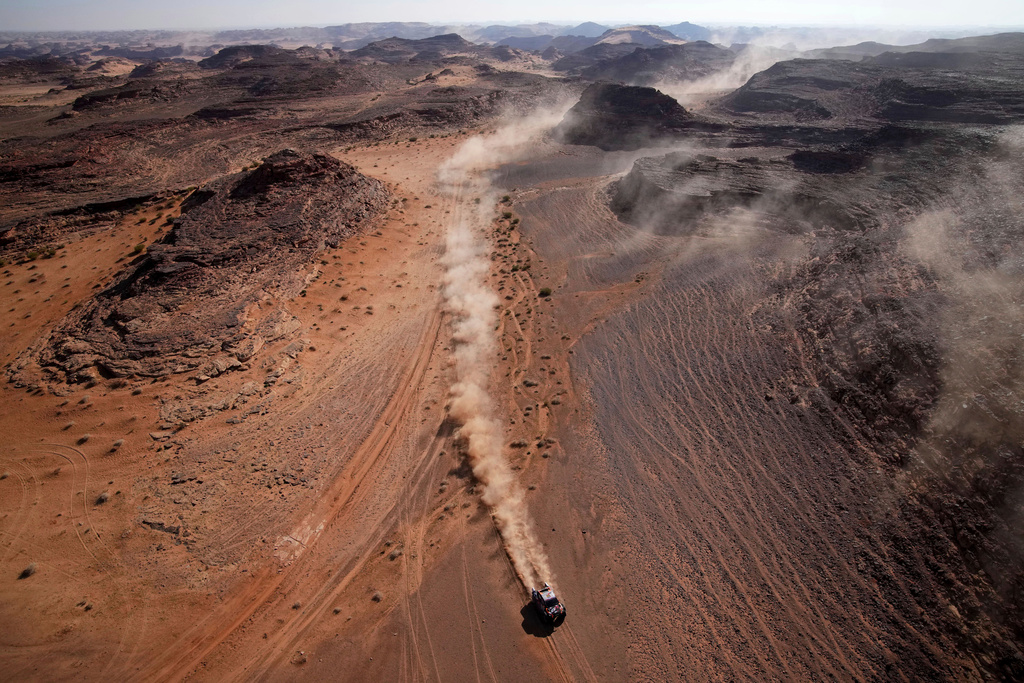 Driver Henk Lategan and co-driver Brett Cummings compete during the fourth stage of the Dakar Rally between Al Henakiyah and Alula, Saudi Arabia, Jan. 8, 2025. (AP Photo/Christophe Ena, File)
