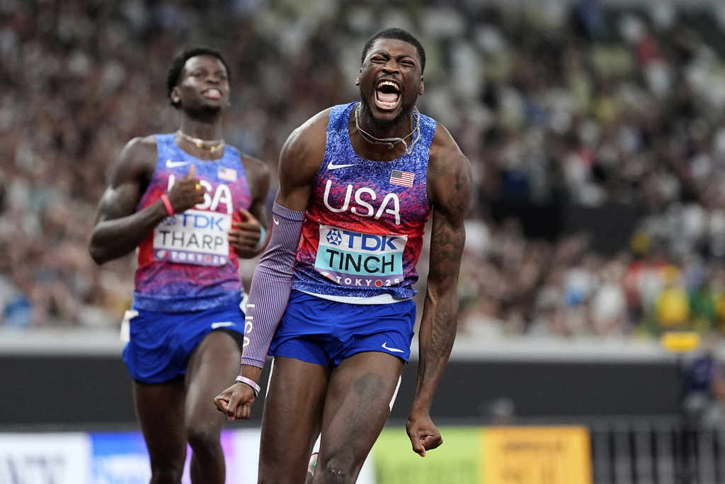 United States' Cordell Tinch wins the gold in the men's 110 meters hurdles final at the World Athletics Championships in Tokyo, Tuesday, Sept. 16, 2025. (AP Photo/Petr David Josek)