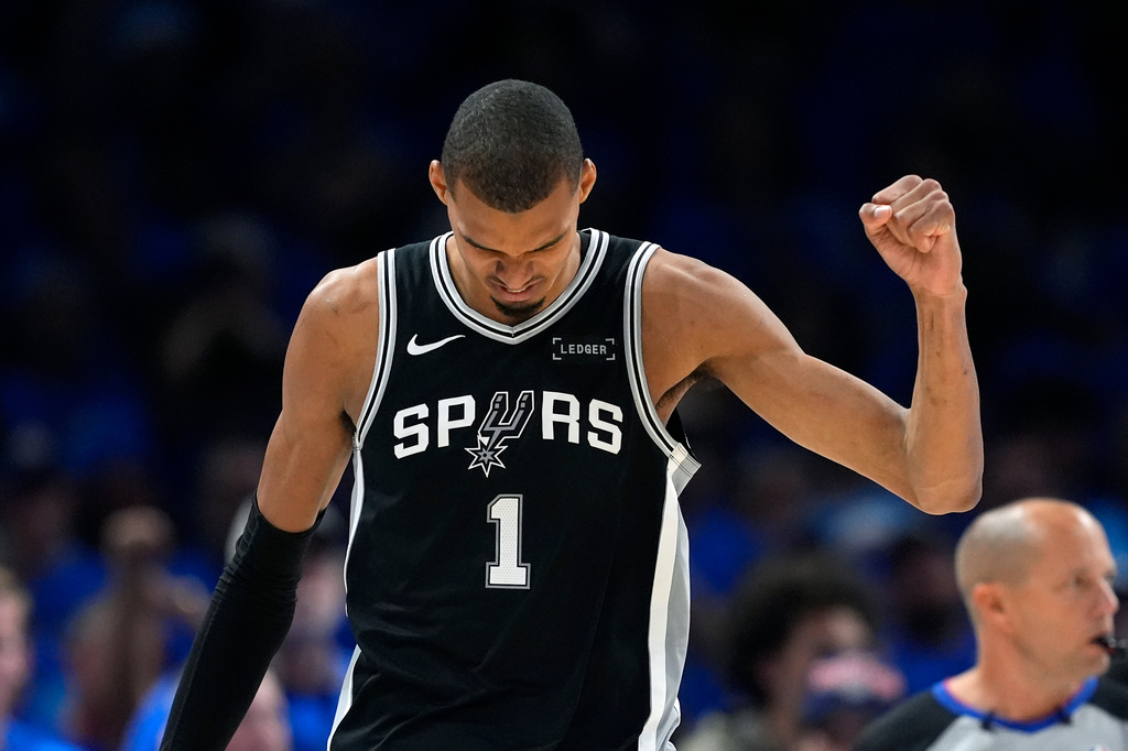 San Antonio Spurs forward Victor Wembanyama celebrates a defensive stop against the Oklahoma City Thunder during the second half of Game 7 of the Western Conference finals of the NBA basketball playoffs series, Saturday, May 30, 2026, in Oklahoma City. (AP Photo/Tony Gutierrez)