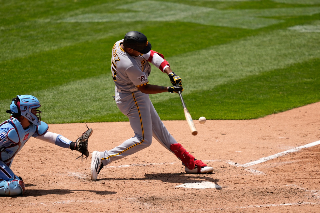 Pittsburgh Pirates' Esmerlyn Valdez hits a run-scoring single against Philadelphia Phillies pitcher Tim Mayza during the fifth inning of a baseball game Thursday, July 2, 2026, in Philadelphia. (AP Photo/Matt Slocum)