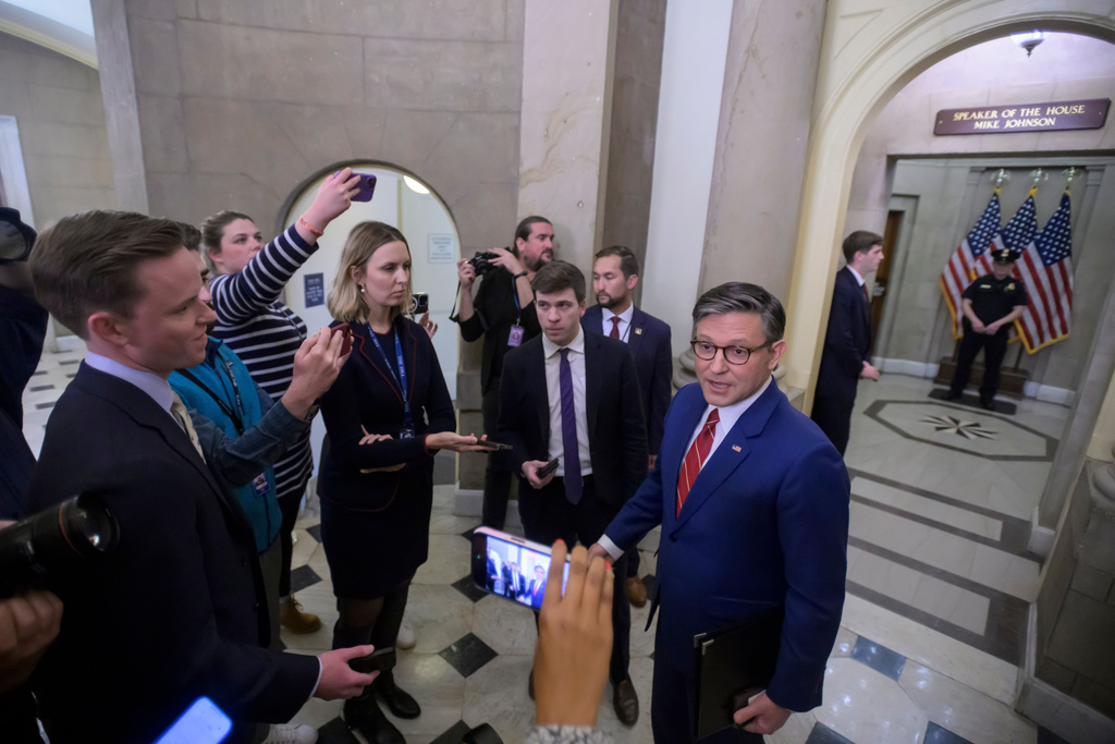 Speaker of the House Mike Johnson, R-La., talks with reporters outside his office at the U.S. Capitol, Wednesday, Nov. 12, 2025, in Washington. (AP Photo/Rod Lamkey, Jr.)