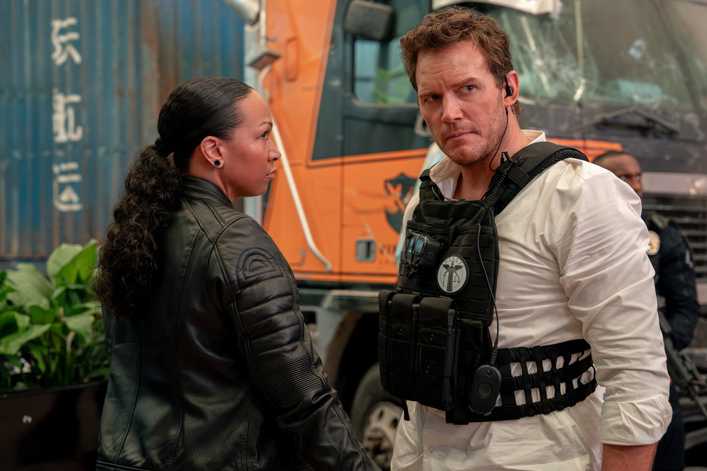This image released by Amazon MGM Studios shows Kali Reis, left, and Chris Pratt in a scene from "Mercy." (Justin Lubin/Amazon MGM Studios via AP)