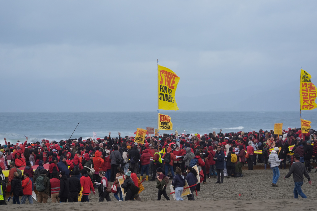 Teachers, students and supporters rally in support of the ongoing teachers strike at the San Francisco Unified School District at Ocean Beach in San Francisco, Wednesday, Feb. 11, 2026. (AP Photo/Jeff Chiu)