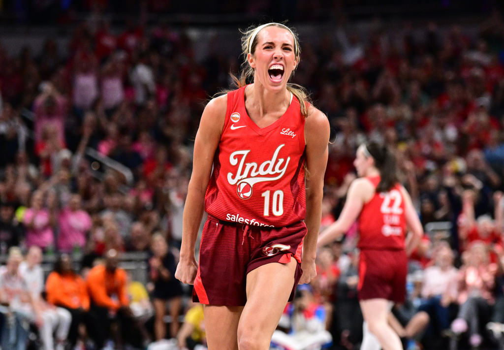 Indiana Fever guard Lexie Hull (10) reacts to a basket during the first half of a WNBA basketball game against the Connecticut Sun, Friday, Aug. 28, 2026, in Indianapolis. (AP Photo/Marc Lebryk)