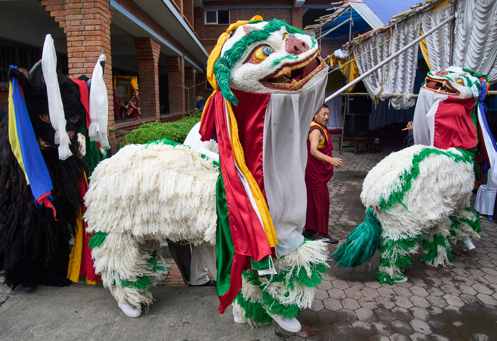 Tibetan men prepare to perform dancing at a cultural show during the 91st birthday celebration of spiritual leader the Dalai Lama in Kathmandu, Nepal, Monday, July 6, 2026. (AP Photo/Niranjan Shrestha)