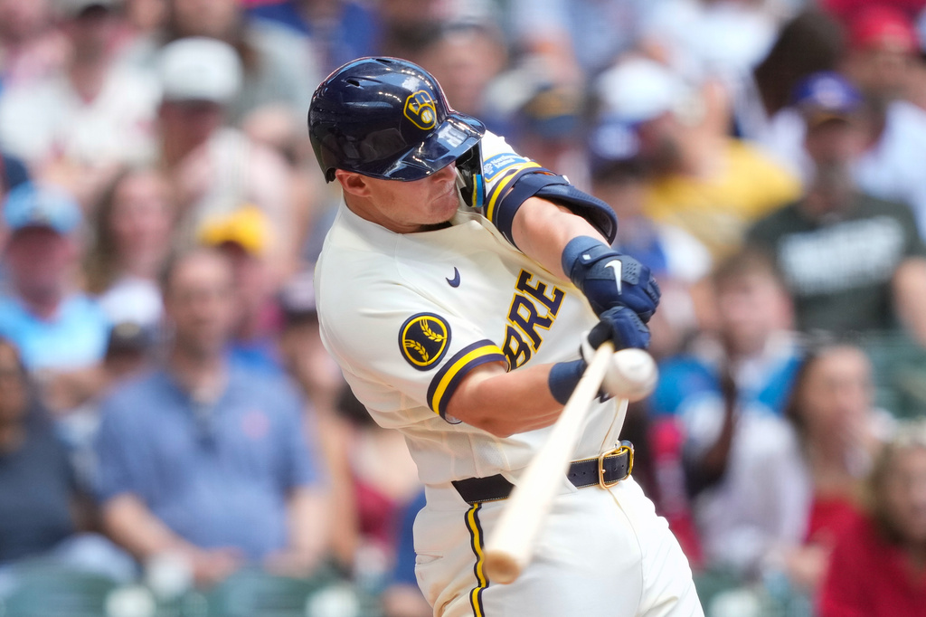 Milwaukee Brewers' Andrew Vaughn hits a double during the fourth inning of a baseball game against the St. Louis Cardinals Monday, May 25, 2026, in Milwaukee. (AP Photo/Kayla Wolf)