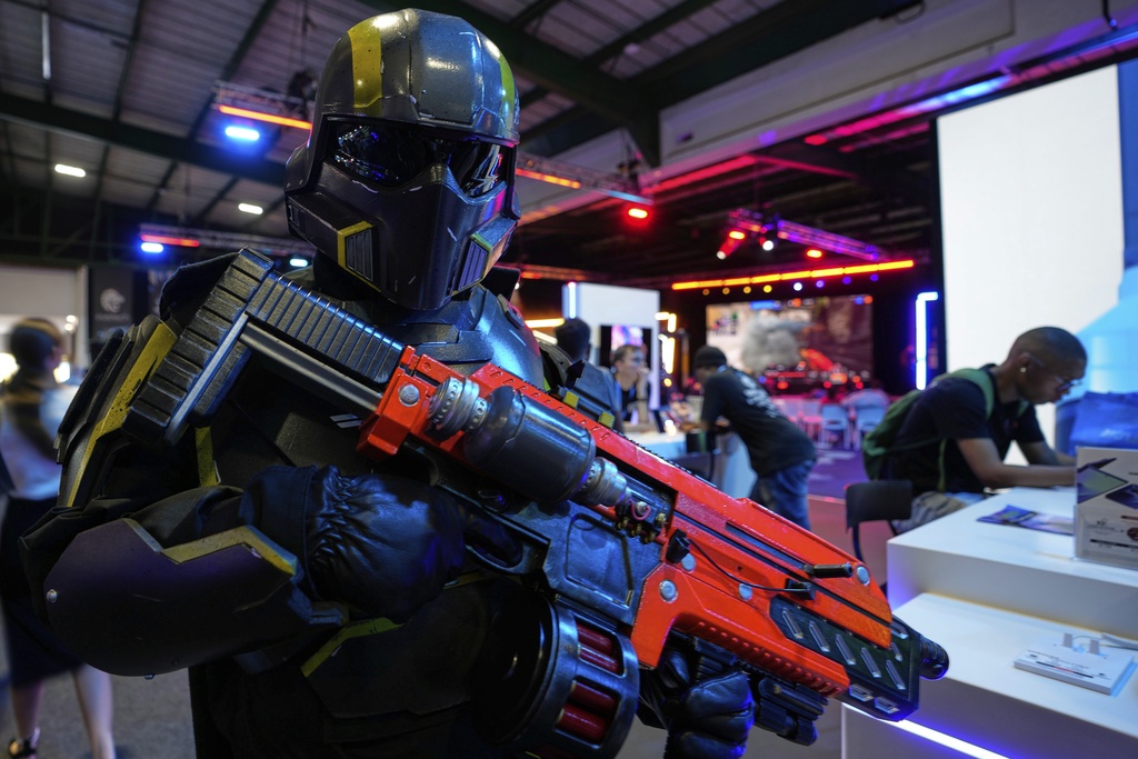 A man dressed up as a robot attends the Comic Con Festival in Johannesburg, South Africa, Saturday, Aug. 30, 2025. (AP Photo/Themba Hadebe)