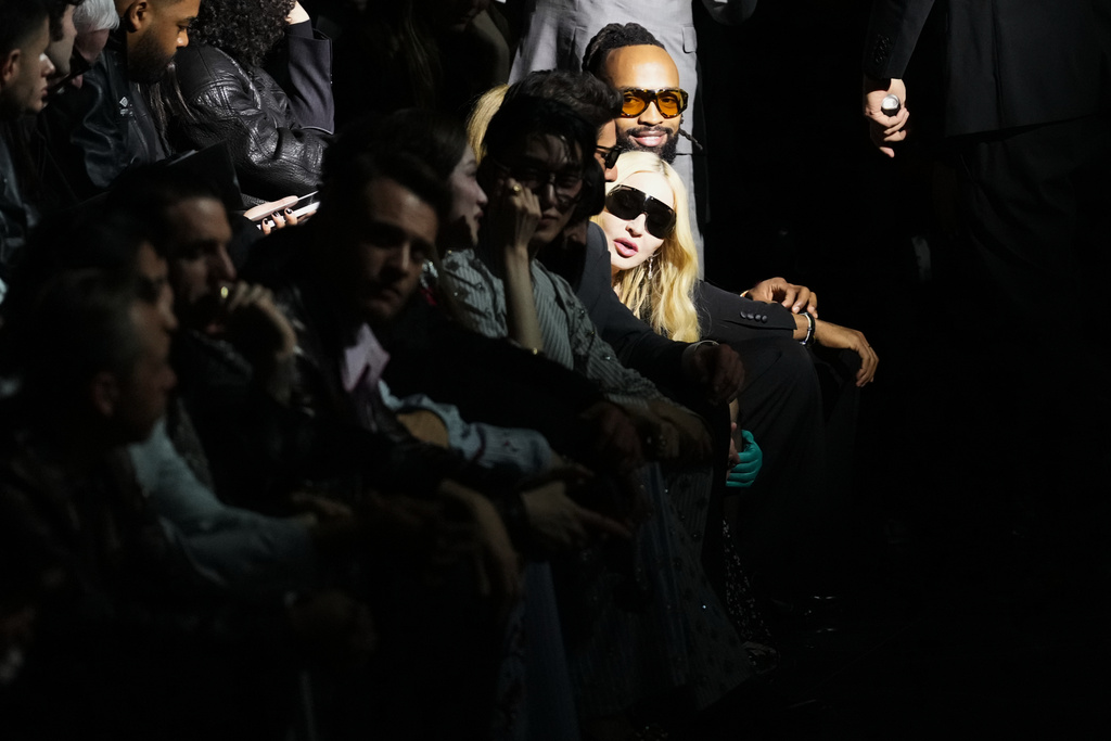 Madonna attends the Dolce & Gabbana Fall/Winter 2026-2027 Women's collection, presented in Milan, Italy, Saturday, Feb. 28, 2026. (AP Photo/Antonio Calanni)