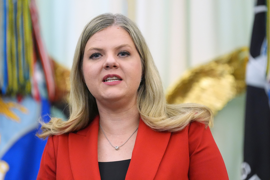 Heidi Overton, deputy director of the White House Domestic Policy Council, speaks during a meeting to sign an executive order about vaccines, Monday, Aug. 10, 2026, in the Oval Office of the White House in Washington. (AP Photo/Jacquelyn Martin)