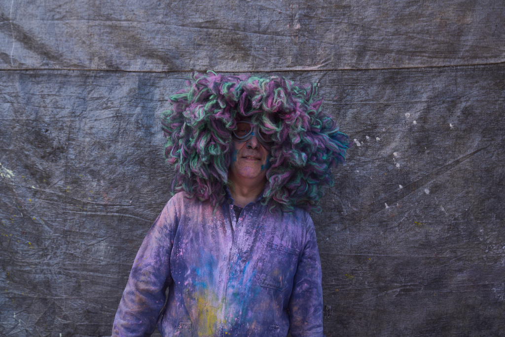 Takis Karayorgos, age 61, poses for a photograph as he participates in the annual flour war marking the end of the Carnival season on Clean Monday in Galaxidi, about 200 kilometers (120 miles) west of Athens, Monday Feb. 23, 2026, at the start of the 40-day Christian Lent fast leading to Easter. (AP Photo/Petros Giannakouris)