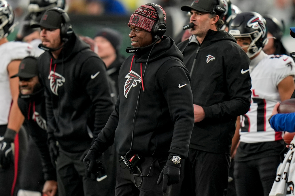 Atlanta Falcons head coach Raheem Morris watches play against the New York Jets during the second half of an NFL football game, Sunday, Nov. 30, 2025, in East Rutherford, N.J. (AP Photo/Seth Wenig)