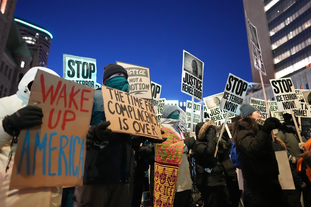 Demonstrators gather during a rally against federal immigration enforcement at Federal Courthouse Plaza on Tuesday, Jan. 27, 2026, in Minneapolis. (AP Photo/Adam Gray)