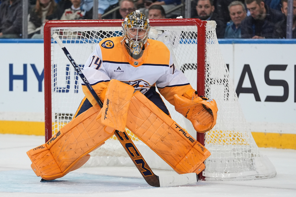 Nashville Predators goaltender Juuse Saros (74) protects the net during the first period of an NHL hockey game against the New York Rangers Monday, Nov. 10, 2025, in New York. (AP Photo/Frank Franklin II)