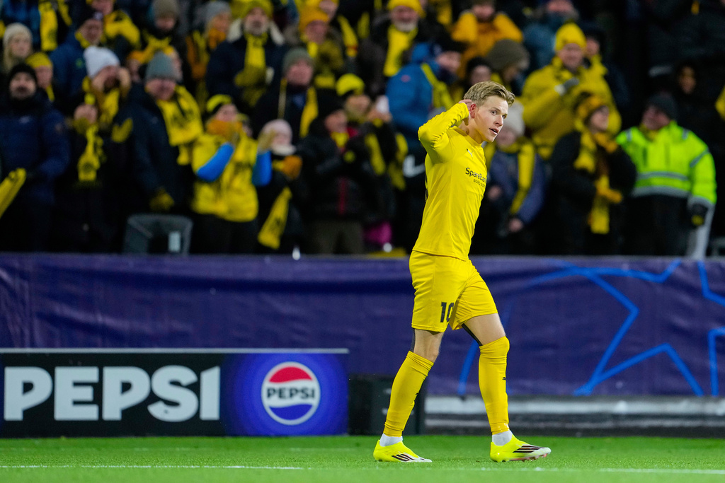 Glimt's Jens Petter Hauge celebrates after scoring during the Champions League soccer match between Bodo/Glimt and Manchester City in Bodo, Norway, Tuesday, Jan. 20, 2026. (Fredrik Varfjell/NTB via AP)