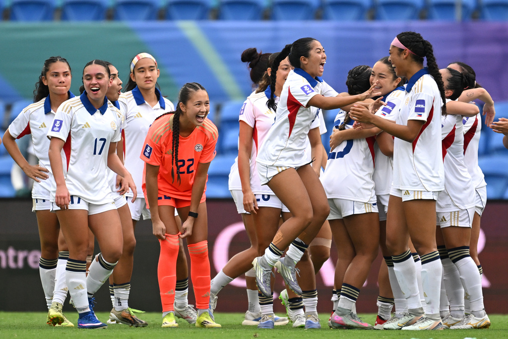 Philippines players celebrate after defeating Uzbekistan in Women's Asian Cup qualifying match for the World Cup, at Gold Coast Stadium In Robina, Australia, Thursday, March 19, 2026. (Dave Hunt/AAP Image via AP)
