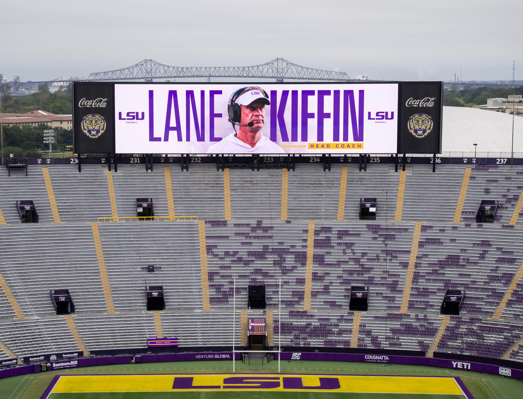 A video board welcomes new LSU head football coach Lane Kiffin at Tiger Stadium in Baton Rouge, La. (Michael Johnson/The Advocate via AP)