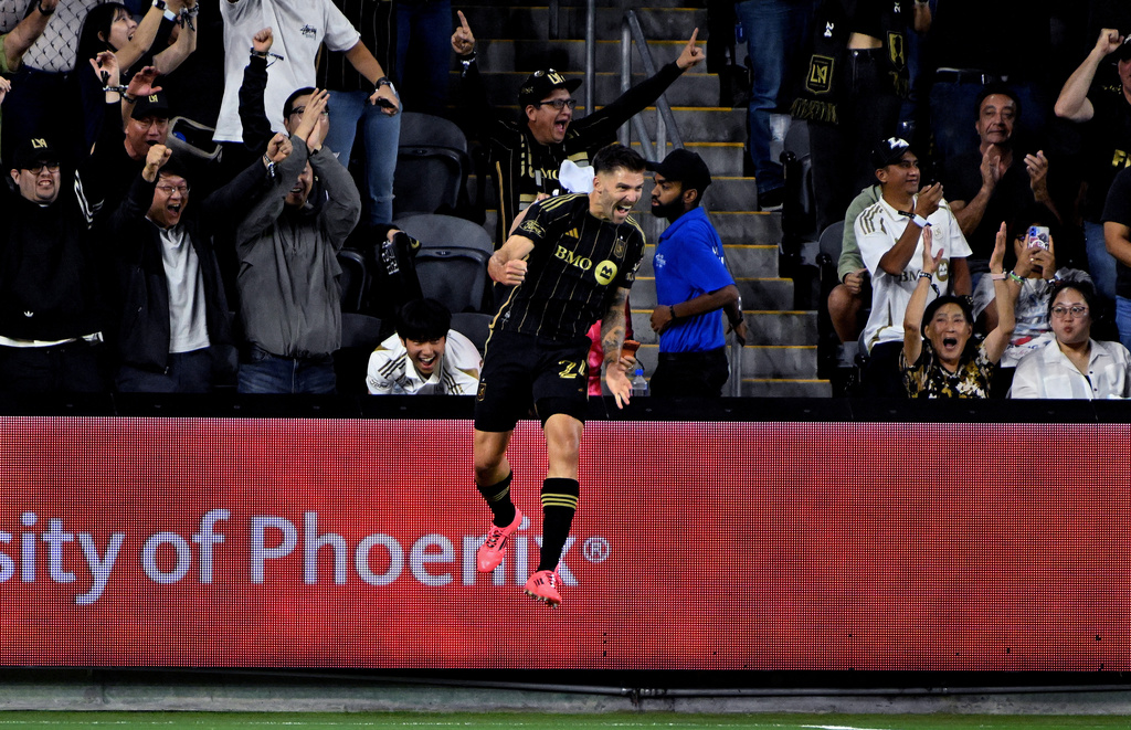 LAFC midfielder Ryan Hollingshead celebrates his goal against Austin FC during the first half of Game 1 in the first round of MLS soccer's Western Conference playoff Wednesday, Oct. 29, 2025, in Los Angeles. (AP Photo/Wally Skalij)
