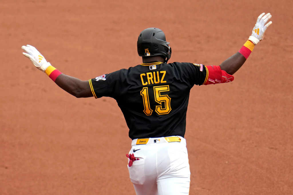 Pittsburgh Pirates' Oneil Cruz celebrates as he rounds first base after hitting a solo home run off Kansas City Royals pitcher Michael Wacha during the fourth inning of a baseball game in Pittsburgh, Sunday, Sept. 20, 2026. (AP Photo/Gene J. Puskar)