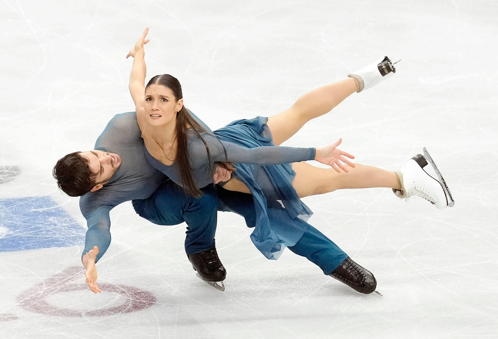 Gold medal winners France's Laurence Fournier Beaudry and Guillaume Cizeron, compete in the Ice Dance Free Dance, during day four of the ISU European Figure Skating Championships in Sheffield, Saturday, Jan. 17, 2026. (Danny Lawson/PA via AP)